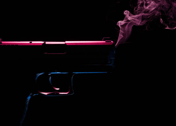 smoking gun - handgun gun blue black imagens e fotografias de stock