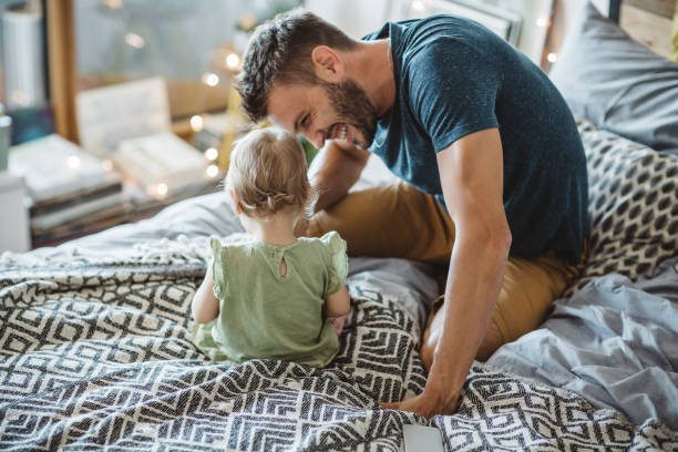 istock Father and daughter spend time together on Christmas 987750836