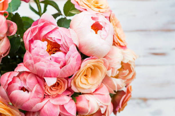 istock Fresh bunch of pink peonies and roses 987777016