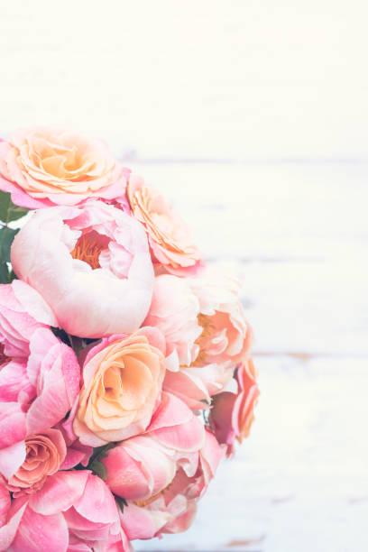 istock Fresh bunch of pink peonies and roses 987779172