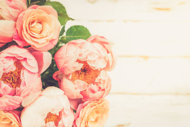 istock Fresh bunch of pink peonies and roses 987781334