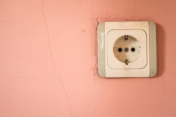 istock Old and Dirty Electricity Outlet 987787436