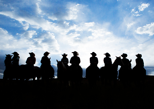 cowgirls cowboys gathered together at countryside of santaquin valley of Salt lake City SLC Utah USA