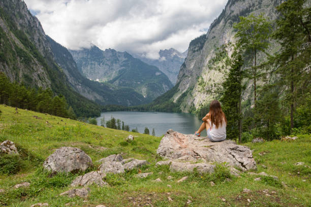 istock Man looking at obersee in Bavarian alps 987827810