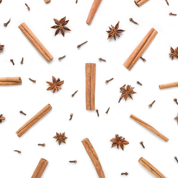 set of cinnamon, clove and star anise, scattered in a chaotic manner, isolated on white background - mannered imagens e fotografias de stock