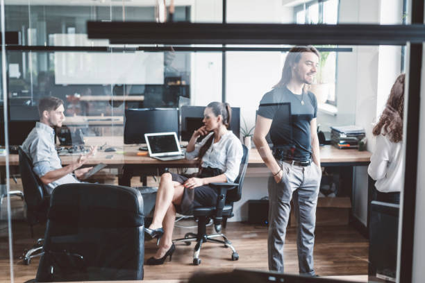 istock Young people are working in this modern office space 987832774