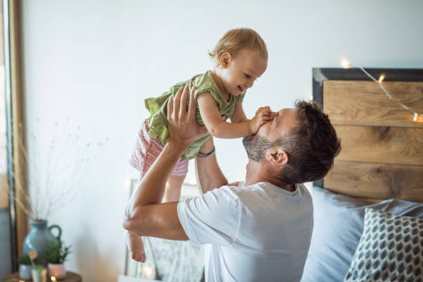istock Father and daughter spend time together on Christmas 987846474