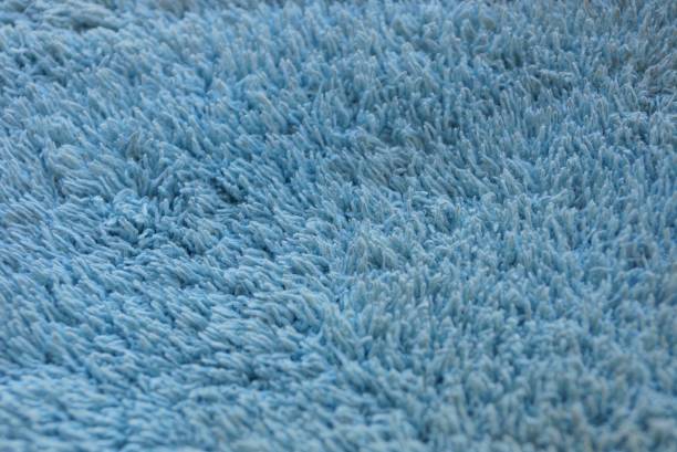istock blue fabric texture of wool and lint 987886244