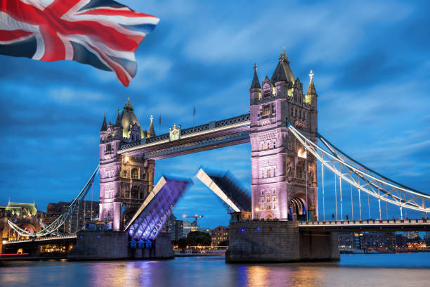 istock Famous Tower Bridge with open gate in the evening, London, England, UK 987888018