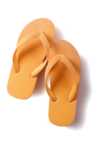 istock Flip flops yellow isolated on white background 987888508