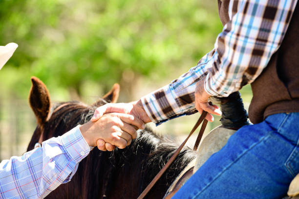 Two American Ranchers Greet by Shaking Hands Spanish Fork Utah USA