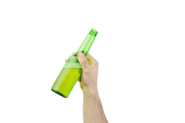 istock Hand Holding Ice Cold Wet Green Beer Bottle Isolated On White  Background 987890818