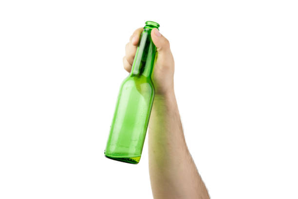 istock Hand Holding Ice Cold Wet Green Beer Bottle Isolated On White  Background 987890858