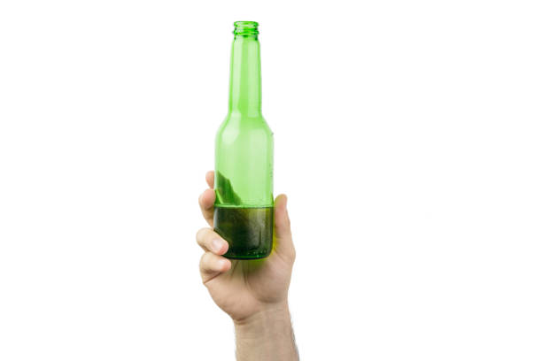 istock Hand Holding Ice Cold Wet Green Beer Bottle Isolated On White  Background 987891150