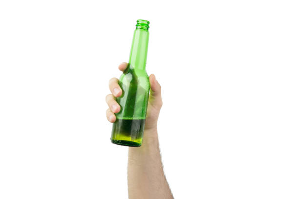 istock Hand Holding Ice Cold Wet Green Beer Bottle Isolated On White  Background 987891188