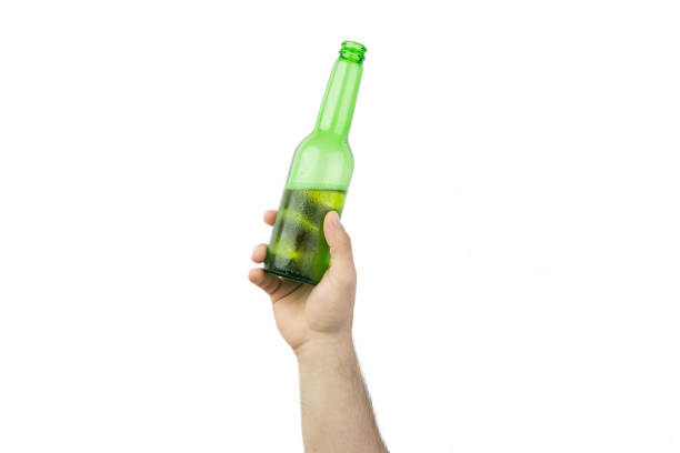 istock Hand Holding Ice Cold Wet Green Beer Bottle Isolated On White  Background 987891222