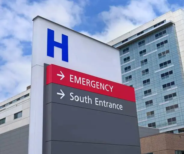 Photo of sign with capital letter H for hospital