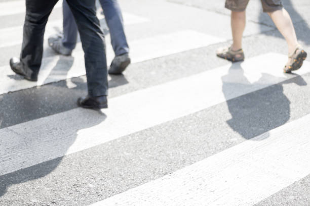 istock People walking on the pedestrian crossing 987892856