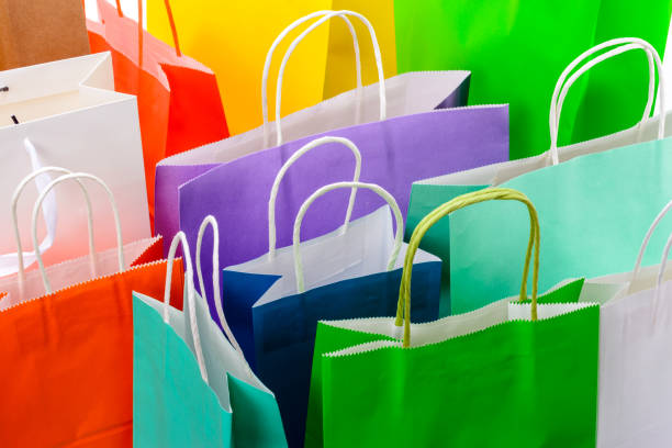 istock Paper shopping bags on white background 987904530