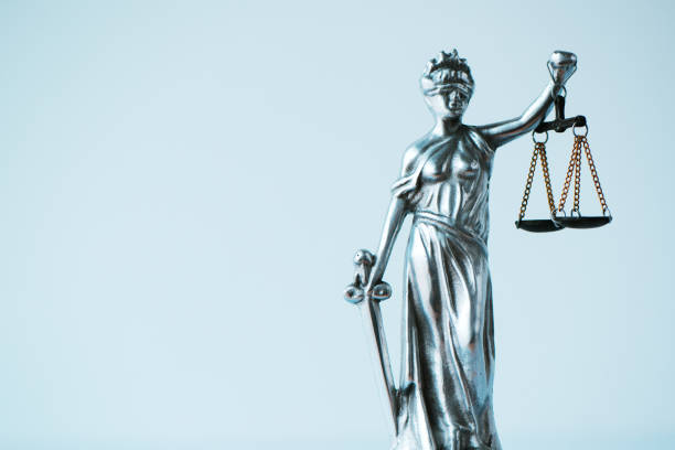 istock Lady Justice statue in law office 987917006