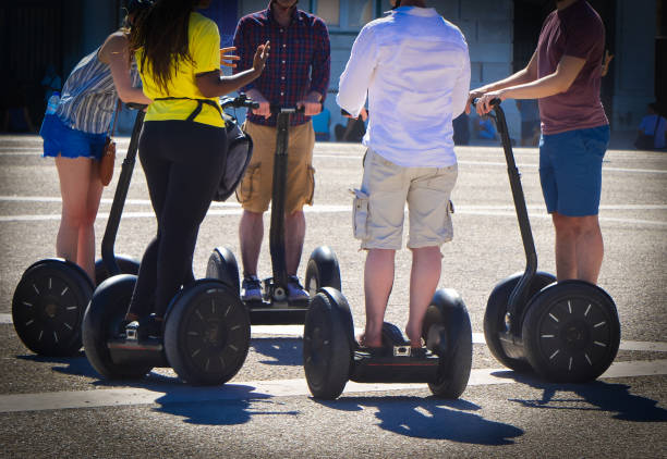 Lisbon, Portugal - August 05, 2017: A group of people guided segway tour in a tourist place