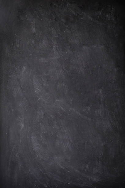 Empty green chalkboard texture hang on the white wall. double frame from greenboard and white background.