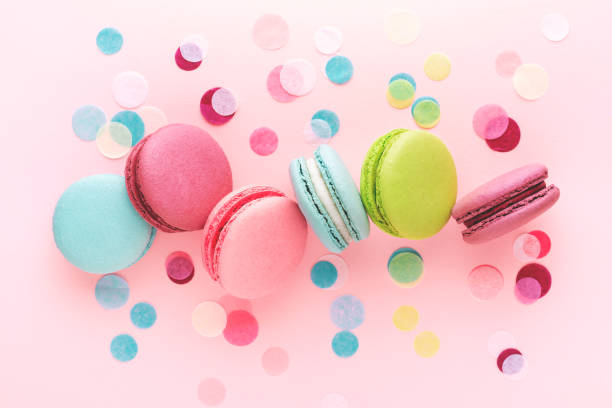 istock Colorful sweet macarons with confetti. 987937292