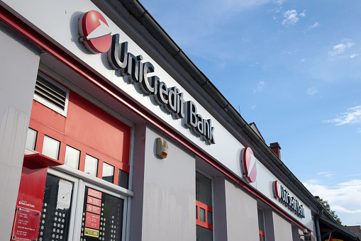 Picture of a of the Unicredit sign on their branch of Zemun, suburb of Belgrade, Serbia, during a sunny afternoon. UniCredit is an Italian global banking and financial services company.