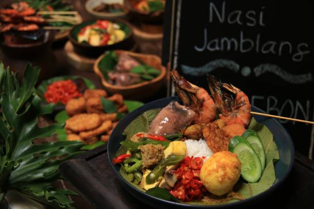 istock Nasi Jamblang, Traditional Rice Dish with Variety of Side Dishes from Cirebon, West Java 987952976