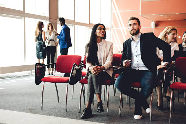 istock Business People at a Conference Meeting Standing 987972090