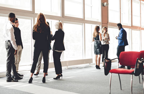 istock Business People at a Conference Meeting Standing 987976464