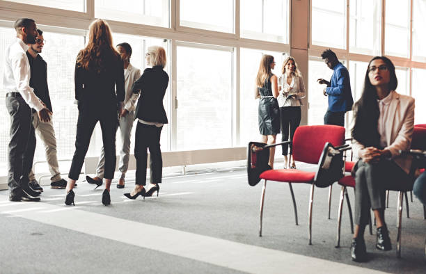 istock Business People at a Conference Meeting Standing 987976522