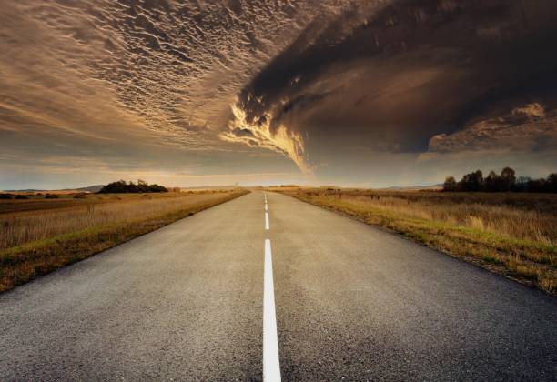 istock country road for background 988065846