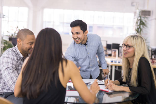 istock Multiethnic business team meeting 988066038