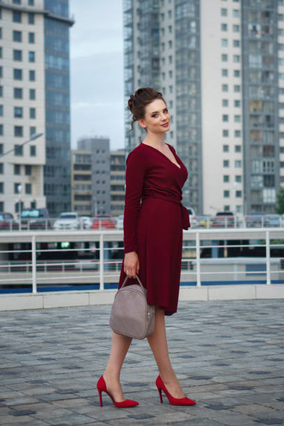 istock Girl in a red dress. 988071696