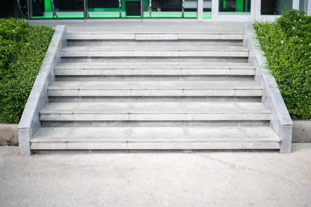 Photo of Abstract Concrete step staircase with plants tree