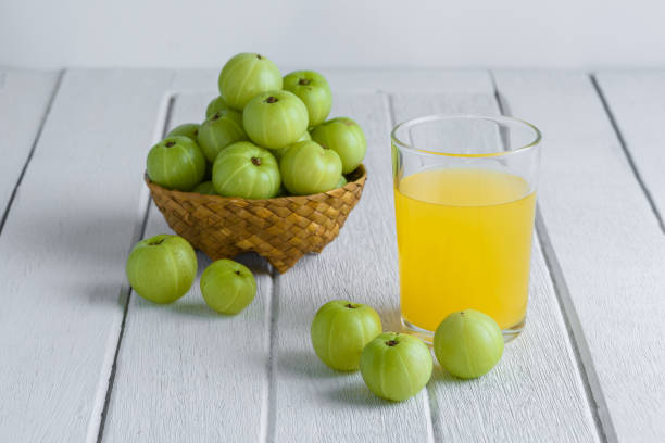 istock Indian gooseberry on wooden table 988132568