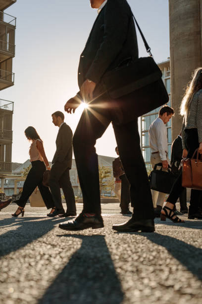 istock Office going people commuting on a busy street 988147840