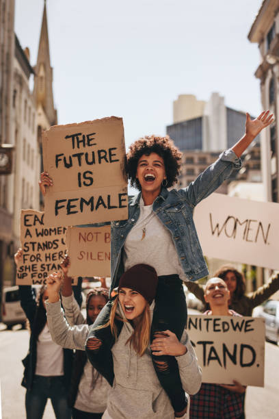 istock Group of women protesting outdoors 988148662