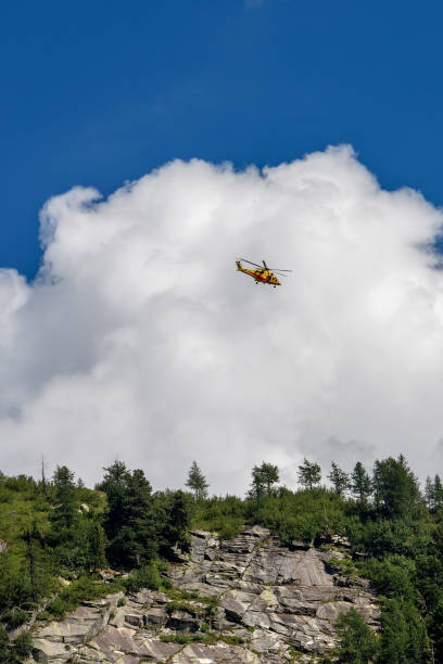 istock Rescue Helicopter in Italian Alps 988169054