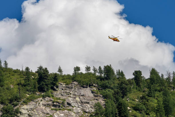 istock Rescue Helicopter in Italian Alps 988174152