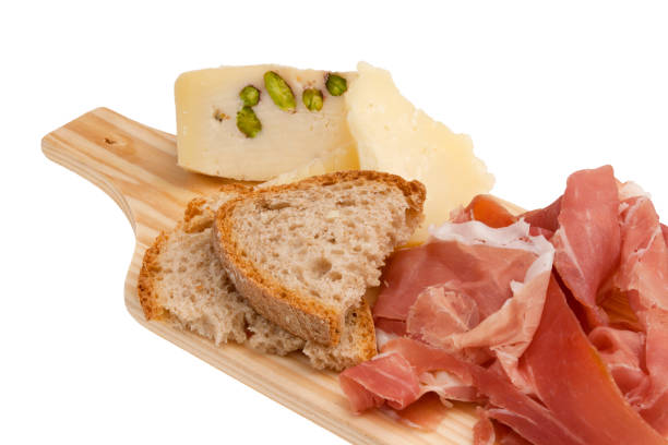 istock Tagliere with ham, bread and pecorino cheese 988174632