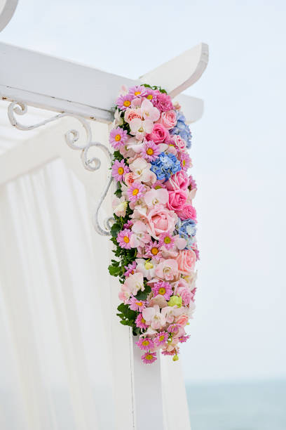 istock Beach Wedding Ceremony on the beach with sea and sky in romantic 988211336