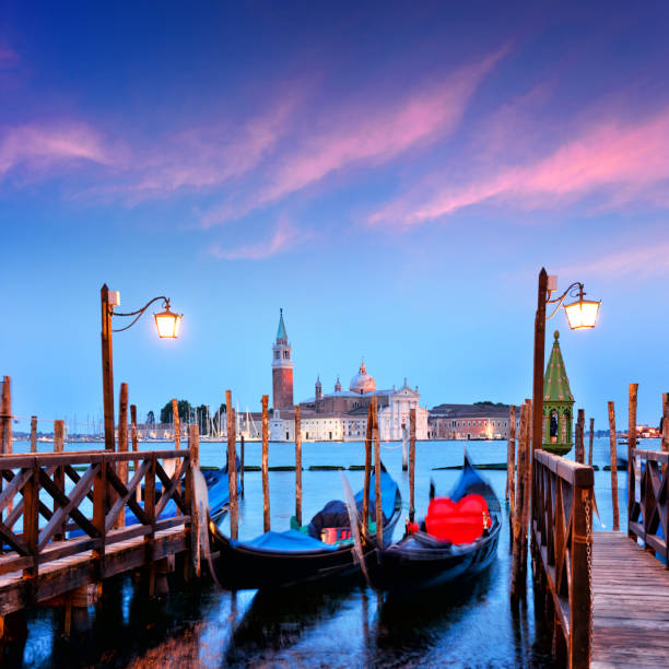 Sunset at Venice, Italy Gondolas at twilight in Venice, Italy. Composite photo san giorgio maggiore stock pictures, royalty-free photos & images