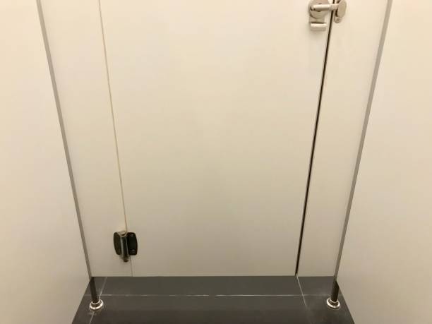 Stainless steel door knob in toilet stock photo