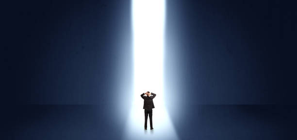 istock Businessman seeing the light at the end of something 988228636