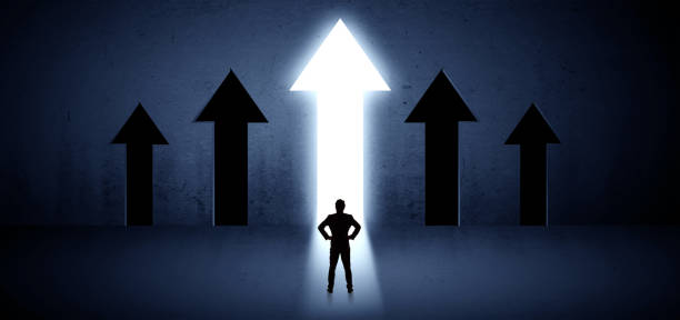 istock Businessman choosing the right way 988228820