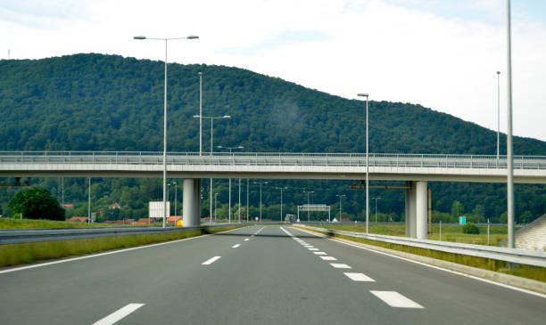 istock Overpass over the highway to the highland 988229650