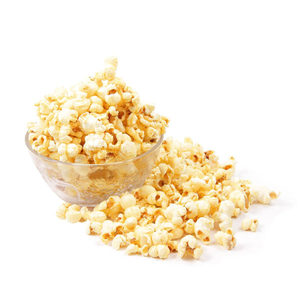 istock Glass bowl with popcorn on white background 988233344