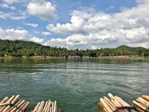 istock Bamboo rafting in tranquility lake 988260468